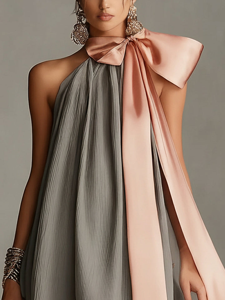 Beatrice | Mini abito grigio in satin con fiocco rosa e pizzo